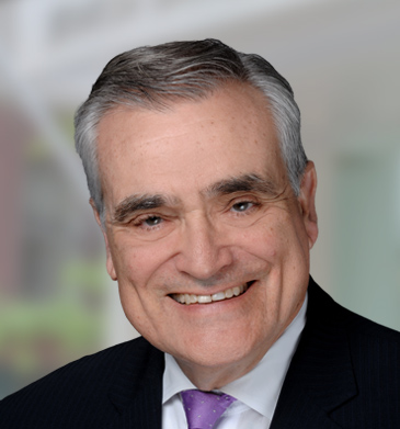 Executive Vice Chairman Steven Nasatir headshot smiling with purple tie and black suit.