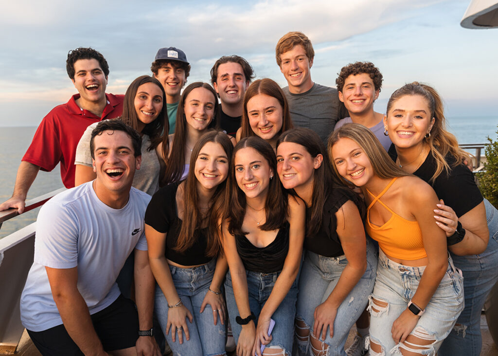 A group of springboard teens smiling for a photo.