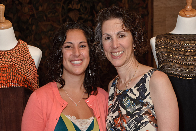 Mother and daughter posing for a photo.