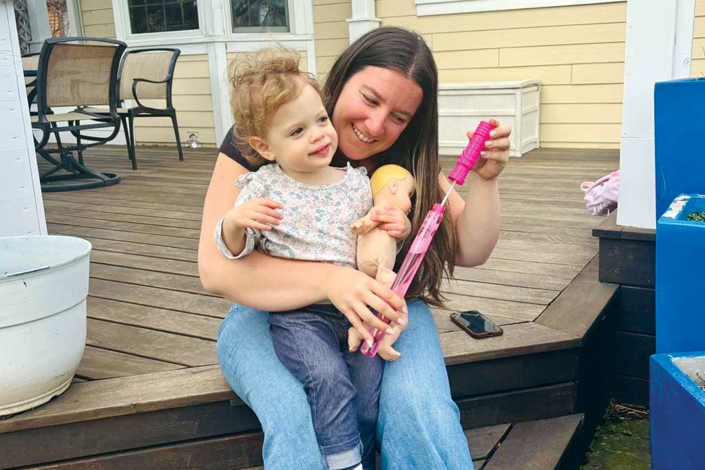 The author and her niece in the yard of Kayla's childhood home.