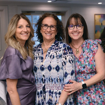 A record 153 women, the highest attendance to date, gathered in June for the 2026 Elaine Levy Ordower Women&rsquo;s Philanthropy Annual Meeting. The group celebrated its outgoing leadership, board, and council members, and proudly welcomed our incoming leaders, new directors, and new members. From left: WB Advisor Cindy Kaplan; WB First Vice President Helene Diamondl and Senior Associate Vice President, Campaign Elissa Kagan.