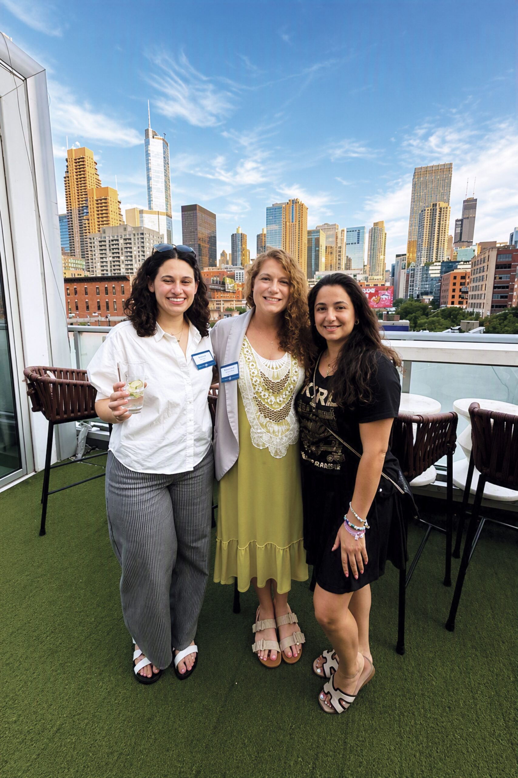A photo of three girls at JUF's Young Real Estate Happy Hour.