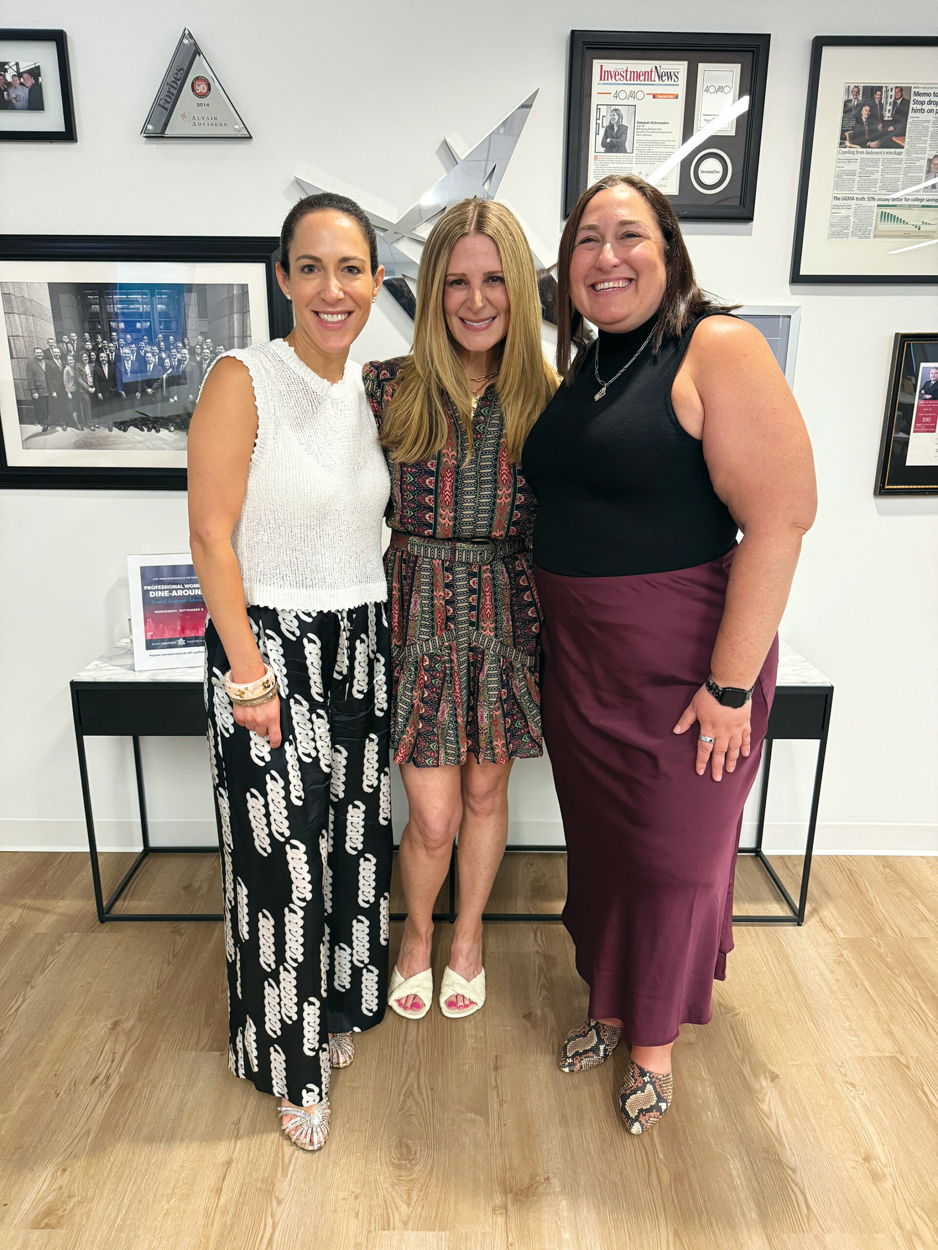 A photo of three women at JUF's professional women's cohort.
