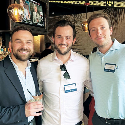 A photo of three individuals at JUF's Jewish Professionals Network Young Lawyers Group happy hour.