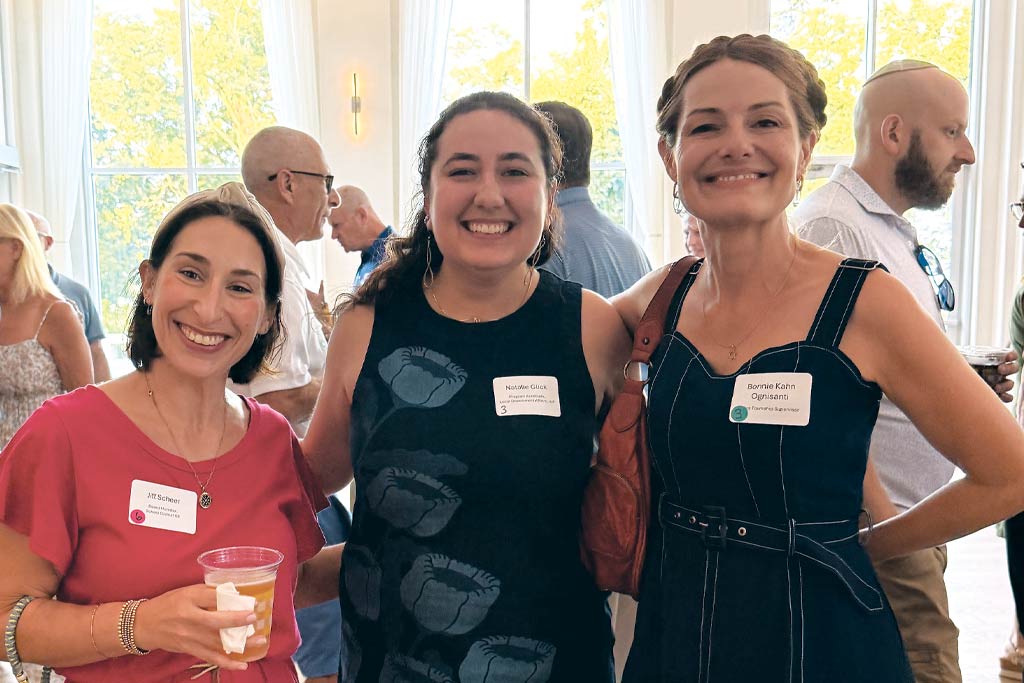 A photo of Jill Scheer, District 68 Board Member; JUF&rsquo;s Natalie Glick; and Bonnie Kahn Ognisanti, Niles Township Supervisor, connecting and enjoying the evening together.