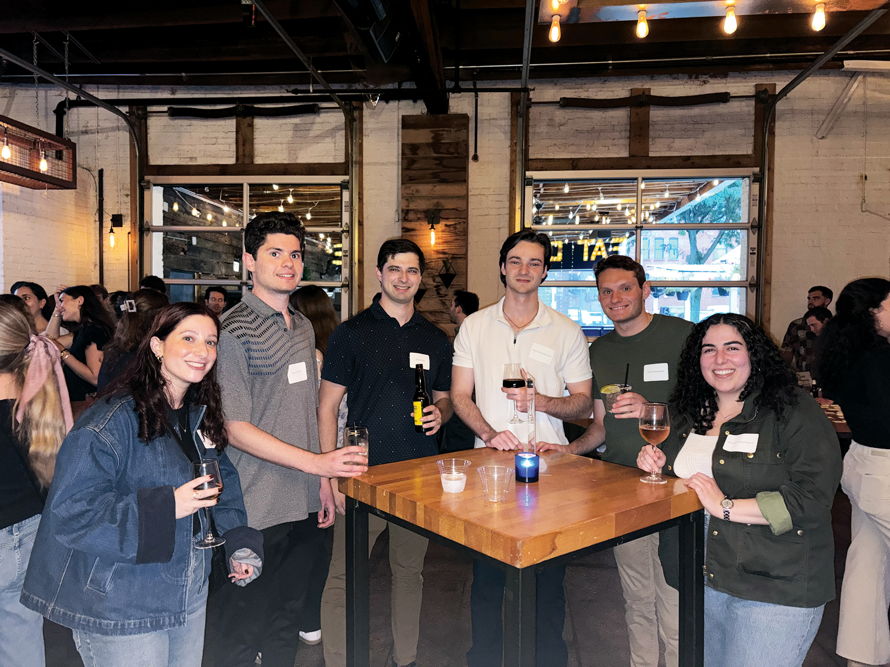 A photo of people at YLD's Newish and Jewish happy hour.