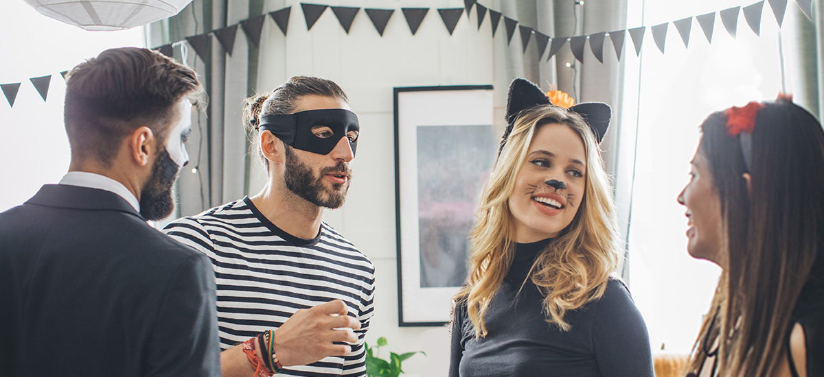 an image of four people wearing costumes